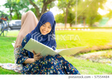 Muslim Student reading book Muslim Student reading book 57554484
