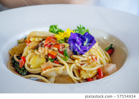 Stir-fried spicy spaghetti with seafoods Stir-fried spicy spaghetti with seafoods 57554934