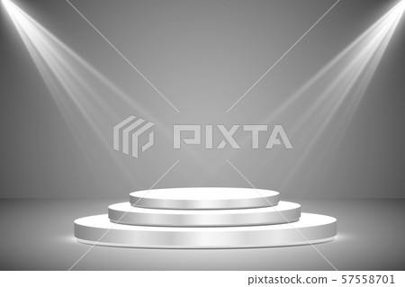Round podium, pedestal or platform illuminated by spotlights on grey background. Stage with scenic 57558701