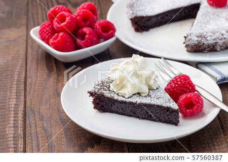 Piece of chocolate sticky brownie cake Piece of chocolate sticky brownie cake 57560387