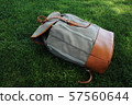 Schoolbag on the lawn Schoolbag on the lawn 57560644