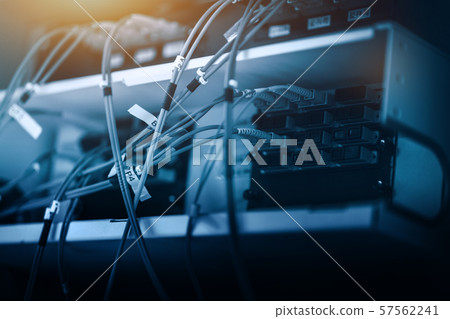 Fibre cable connected to patch. Telecommunication 57562241