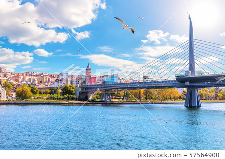 Halic Metro Bridge and Galata Tower on the background, view from the Golden Horn, Istanbul, Turkey 57564900