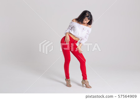 Latina dance, strip dance, contemporary and bachata lady concept - Woman dancing improvisation and 57564909