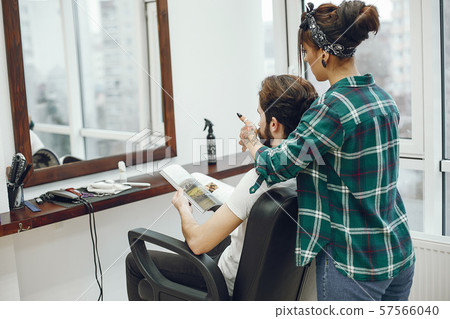 Stylish man sitting in a barbershop 57566040