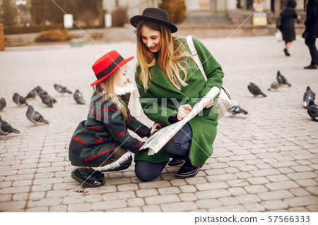 Cute and stylish family in a spring city 57566333