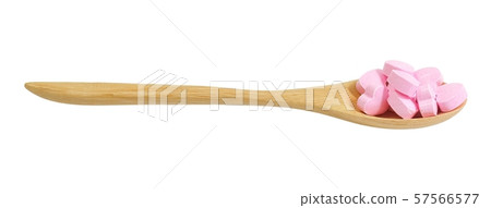 Wooden Spoon Full with Vitamins C on White 57566577