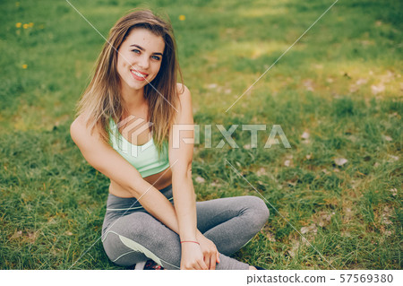 Sports girl in a park Sports girl in a park 57569380
