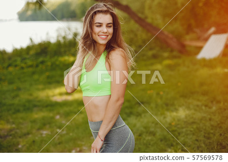 Sports girl in a park 57569578