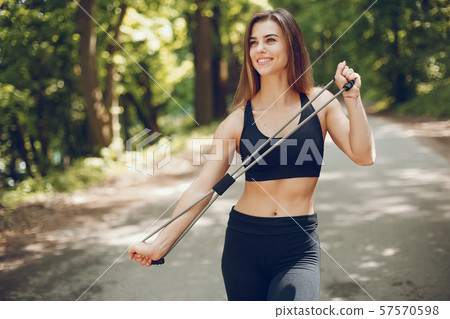 Sports girl in a park 57570598