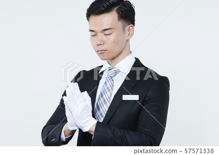 Funeral company male employee 57571338