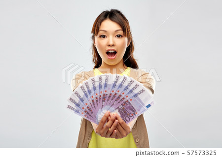 asian woman with hundreds of euro money asian woman with hundreds of euro money 57573325