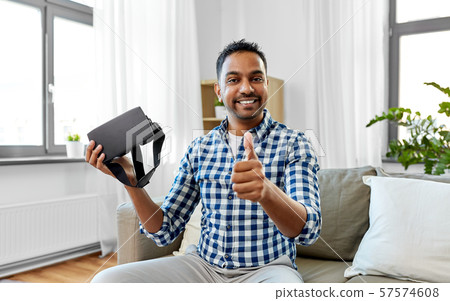 male blogger with vr glasses videoblogging at home male blogger with vr glasses videoblogging at home 57574608