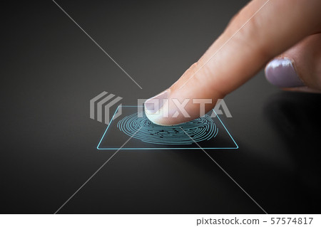 finger touching black interactive panel 57574817