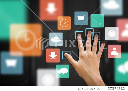 hand using interactive panel with app icons on it 57574882
