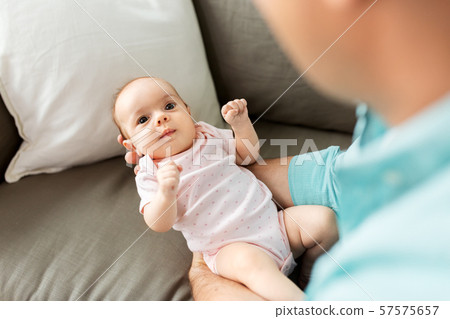 middle aged father with baby daughter at home middle aged father with baby daughter at home 57575657