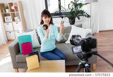 female beauty blogger making video about make up 57575815