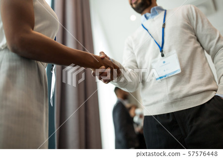 handshake of people at business conference 57576448