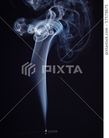 Close up view on incense stick burning with white 57578675