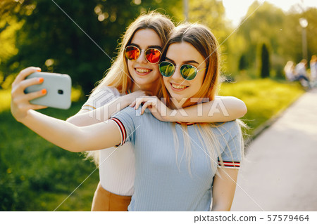 two sister in a park 57579464