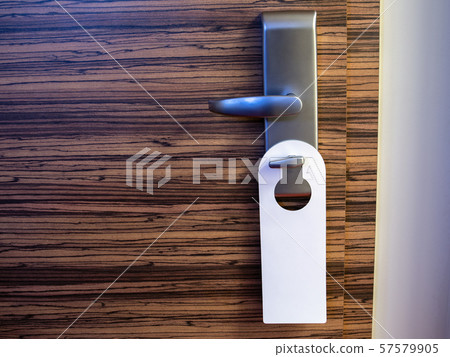 Empty label on a door handle for your text. Please do not disturb Empty label on a door handle for your text. Please do not disturb 57579905