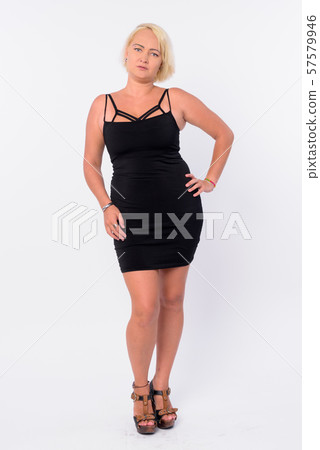 Full body shot of beautiful woman with short blond hair Full body shot of beautiful woman with short blond hair 57579946