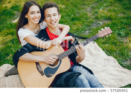 Couple with a guitar 57580401