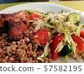 Buckwheat with salad and chicken. Homemade European dinner. 57582195