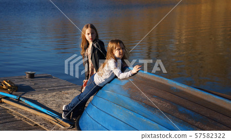 Little sisters on the pier Little sisters on the pier 57582322