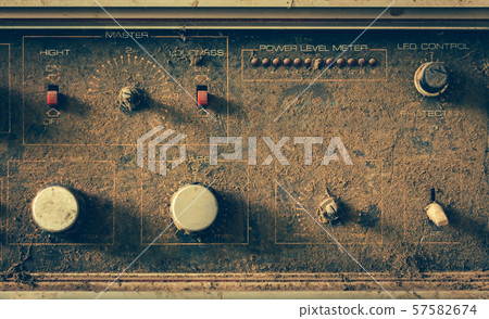 The old amplifiers damaged, placed on the table until the dust was captured. 57582674