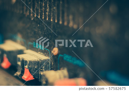 The old amplifiers damaged, placed on the table until the dust was captured. 57582675