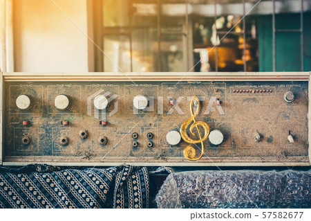 The old amplifiers damaged, placed on the table until the dust was captured. 57582677