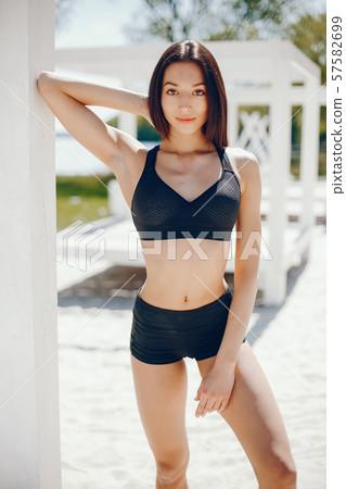 Sunny girl on a beach 57582699