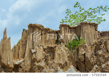 Beautiful Scenery of Water flows through the ground have erosion and collapse of the soil  into a  natural layer at Pong Yub,  Ratchaburi,Thailand Beautiful Scenery of Water flows through the ground have erosion and collapse of the soil  into a  natural layer at Pong Yub,  Ratchaburi,Thailand 57583584