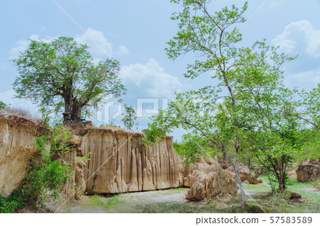 Beautiful Scenery of Water flows through the ground have erosion and collapse of the soil  into a  natural layer at Pong Yub,  Ratchaburi,Thailand Beautiful Scenery of Water flows through the ground have erosion and collapse of the soil  into a  natural layer at Pong Yub,  Ratchaburi,Thailand 57583589