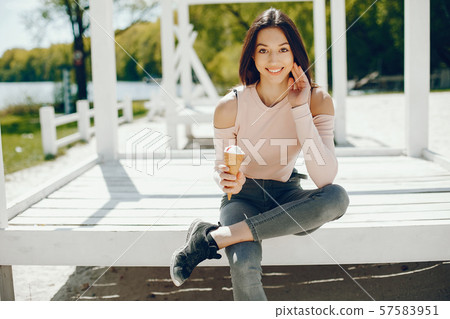 Sunny girl on a beach Sunny girl on a beach 57583951