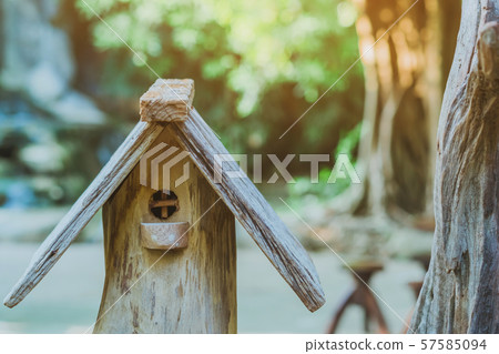 Hand made wooden bird house nest  in public Park , hand wood shelter for birds 57585094