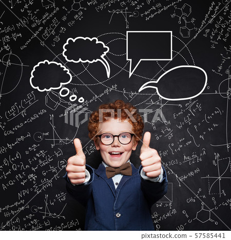 Happy smart child student on blackboard background Happy smart child student on blackboard background 57585441