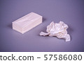 Paper handkerchiefs on a gray background 57586080
