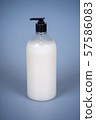 Liquid soap in a plastic bottle with a dispenser 57586083