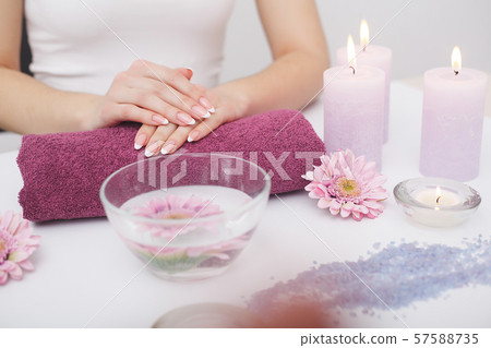 Manicure and Hands Spa. Beautiful Woman Hands Closeup 57588735