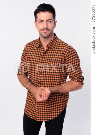 Portrait of handsome bearded hipster man with hands together 57590375