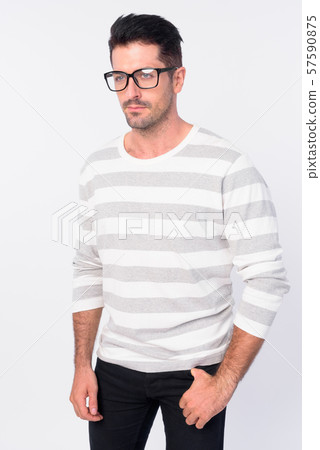 Portrait of handsome bearded man with eyeglasses thinking 57590875