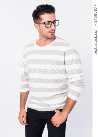 Portrait of handsome bearded man with eyeglasses looking over shoulder 57590877