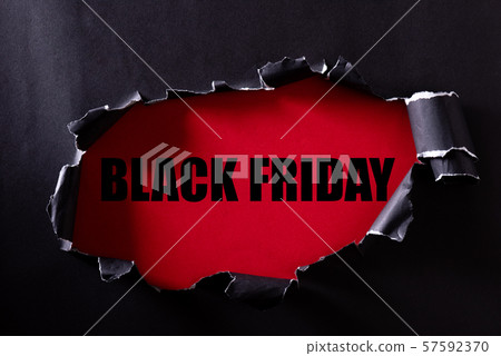 Black torn paper and the text Black Friday Black torn paper and the text Black Friday 57592370