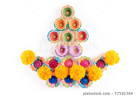 Happy Diwali - Clay Diya lamps lit Happy Diwali - Clay Diya lamps lit 57592384