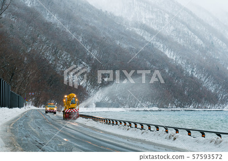 Rotary snowplow removing snow from roads / Winter Hokkaido image Rotary snowplow removing snow from roads / Winter Hokkaido image 57593572