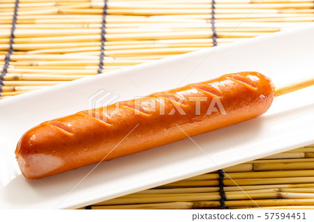 Frank with skewers (Frankfurter sausage on skewers). Frank with skewers (Frankfurter sausage on skewers). 57594451