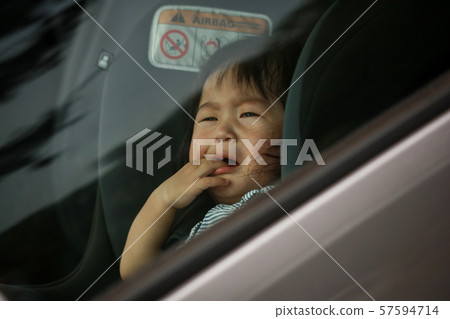 Baby crying in the car Baby crying in the car 57594714