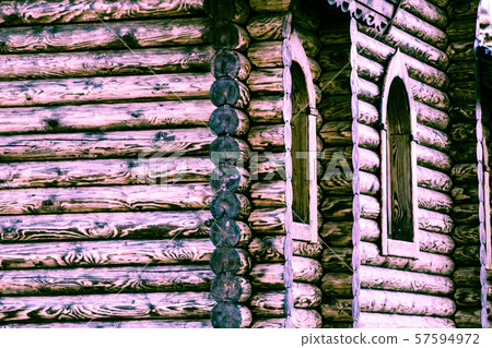 Fragment of a log house with elements of Russian architecture, wooden carvings 57594972